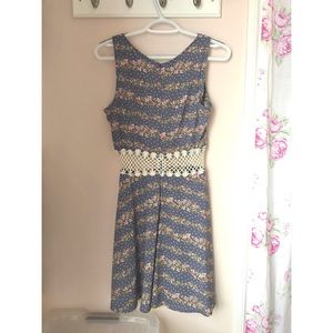 NWOT Periwinkle blue floral dress with crochet detailing at the waist